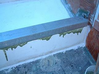 Once the caps are in place, the excess epoxy is cleaned away while still wet