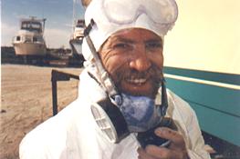 Capt Patrick McCrary properly suited up for grinding fiberglass.